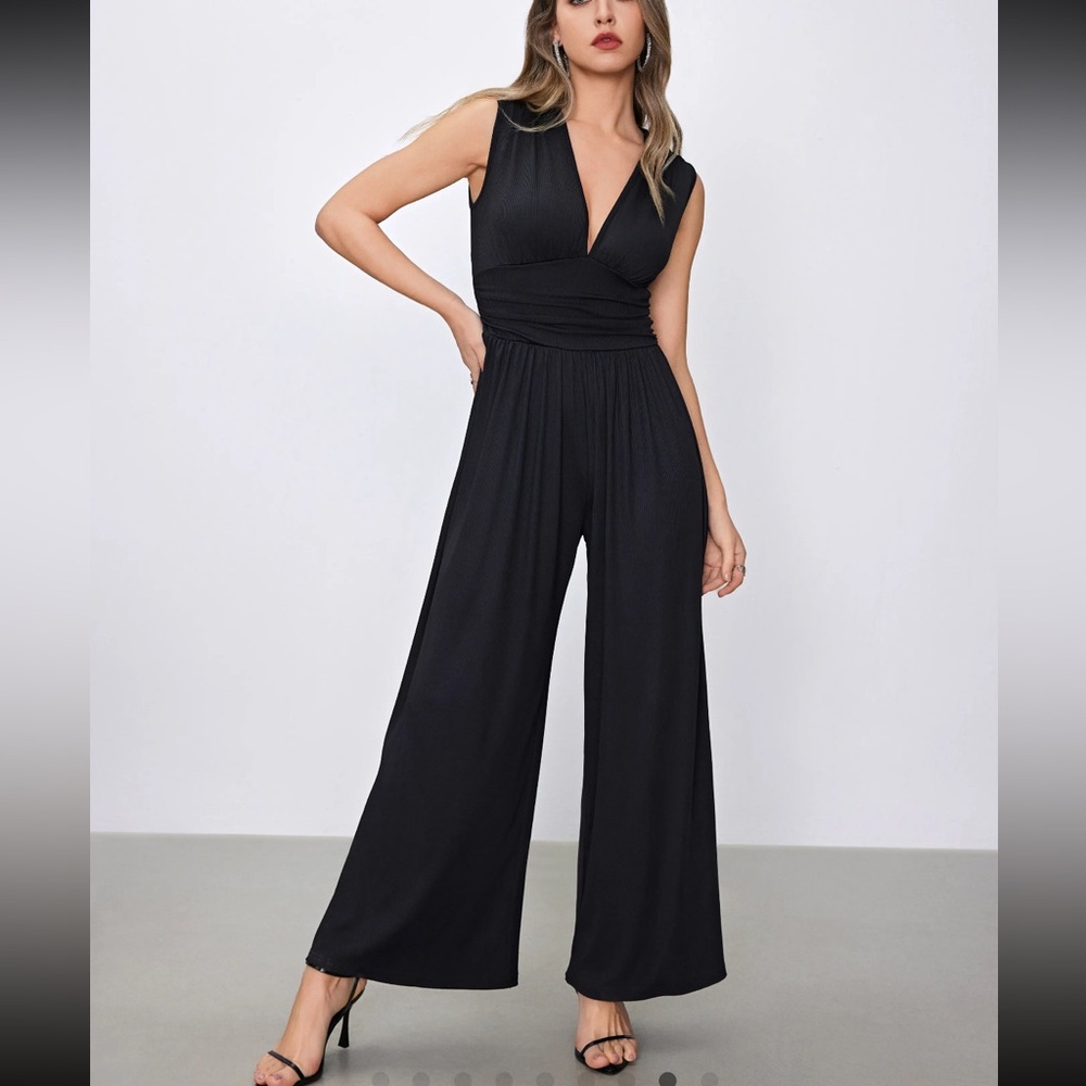 Cute black romper jumpsuit. Never worn